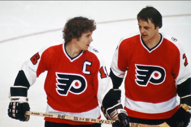 Screenshot 2024-01-06 at 20-57-29 hi-res-86266392-bobby-clarke-and-bill-barber-of-the-philadelphia-flyers_crop_north.webp (WEBP Image 630 × 420 pixels).png