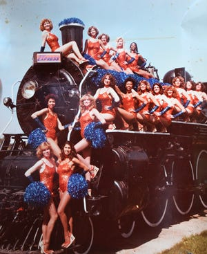 Screenshot 2026-04-12 at 18-24-20 4464e01d-2f37-4983-a6b0-fd99f5a75c07-2018-0618-dm-express-cheerleader0061.jpg (JPEG Image 300 × 367 pixels).png