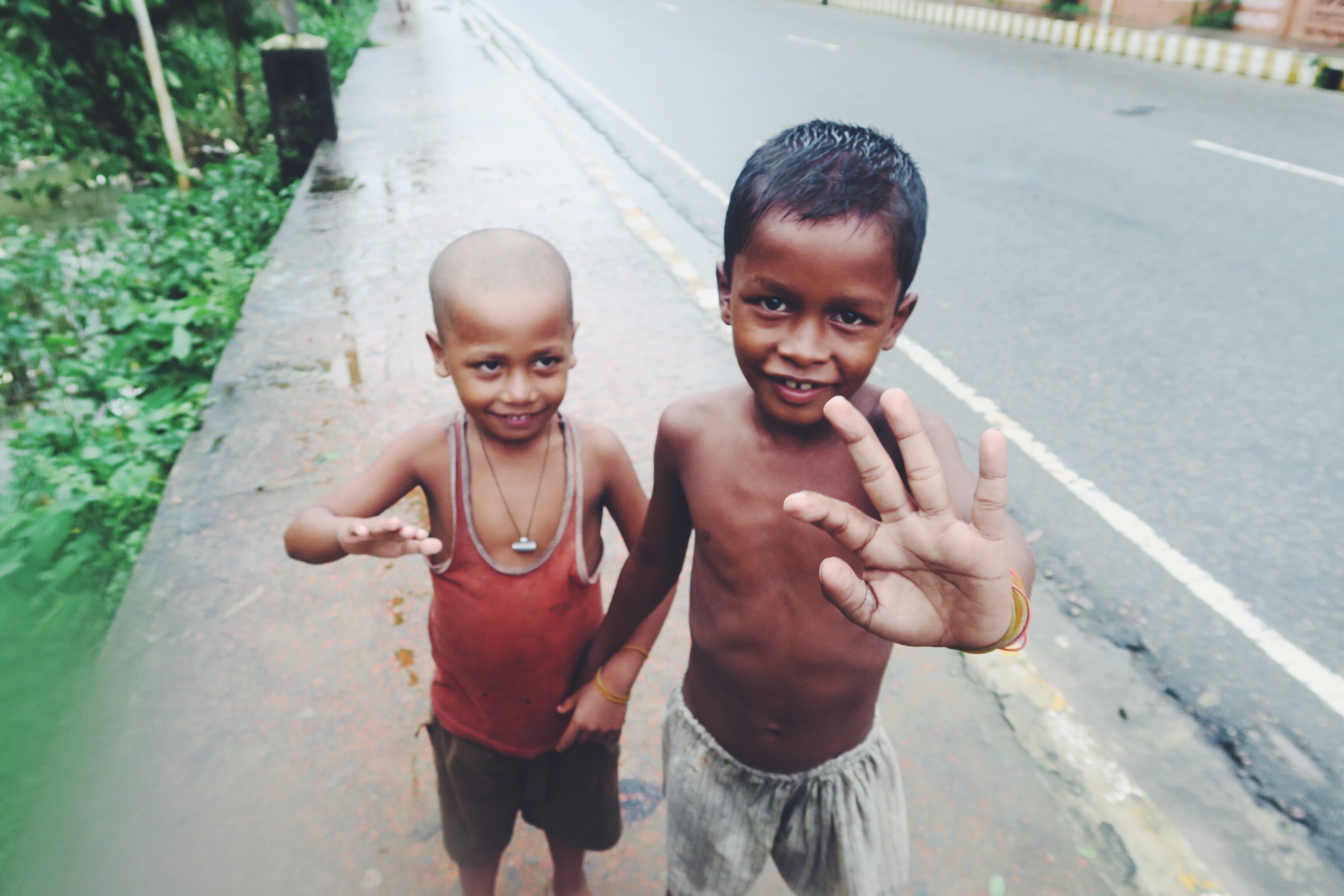 Two beautiful kids following us in the street