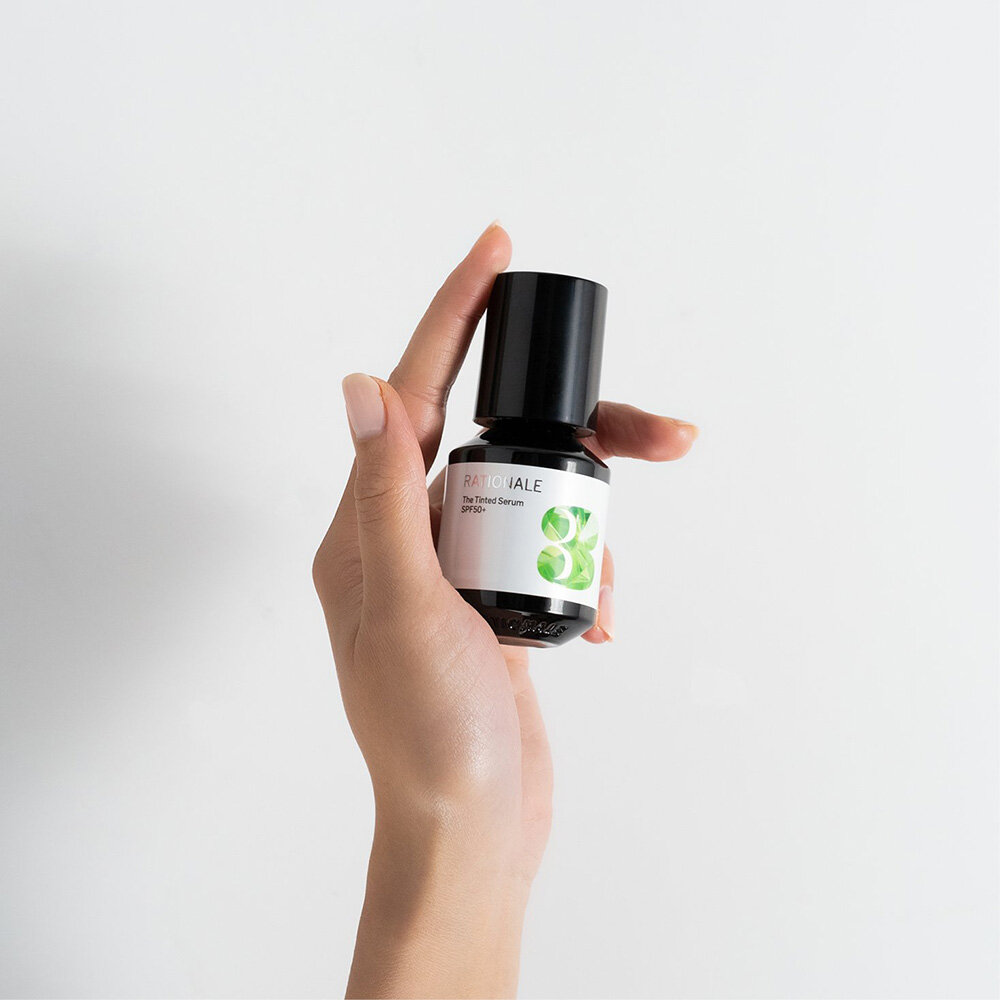 3-TINTED SERUM InHand.jpg