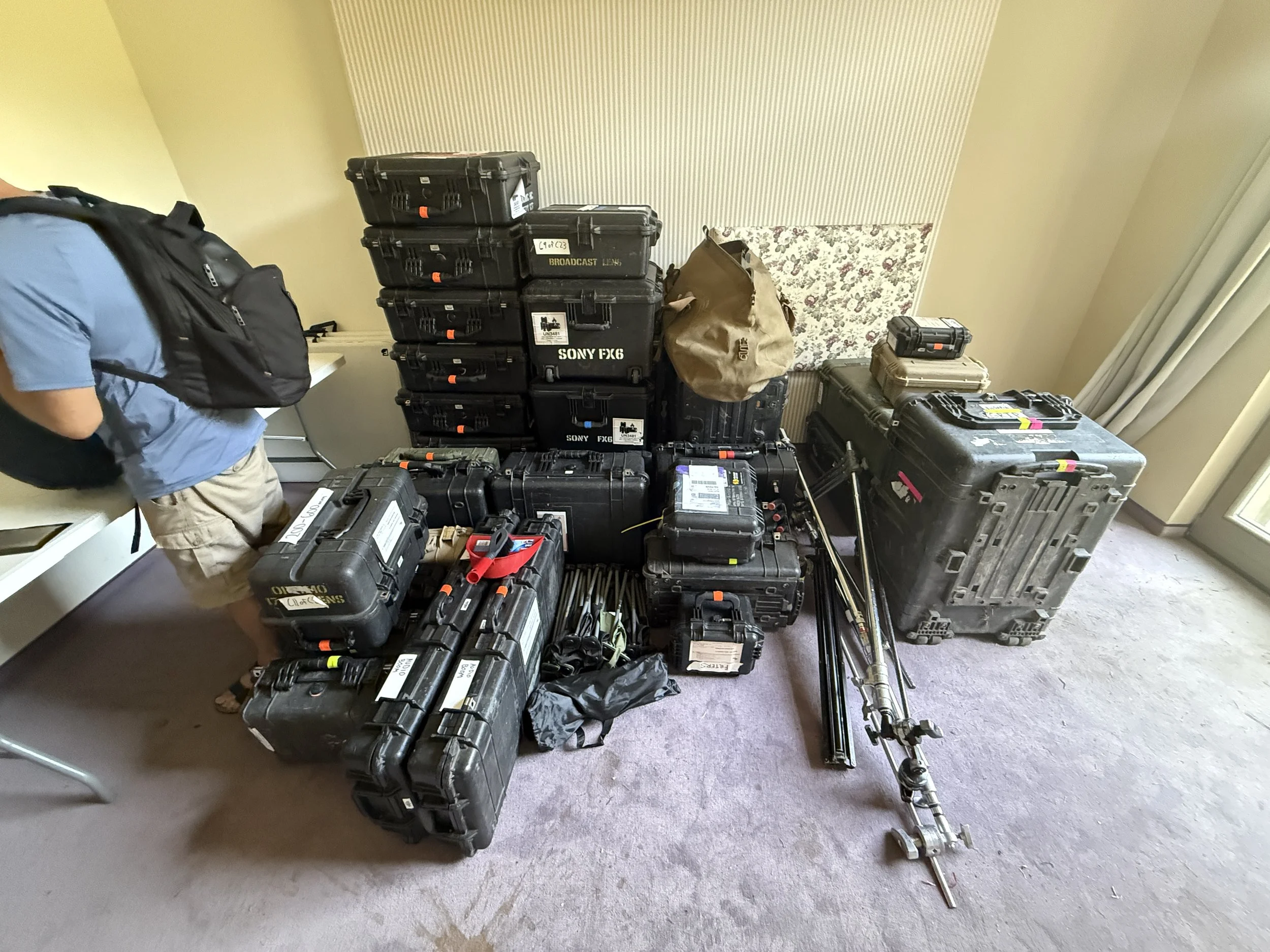 Large collection of camera equipment, Peli cases, C-stands, battery boxes and filming gear packed up for Discovery Channel's Naked and Afraid production in Bulgaria.