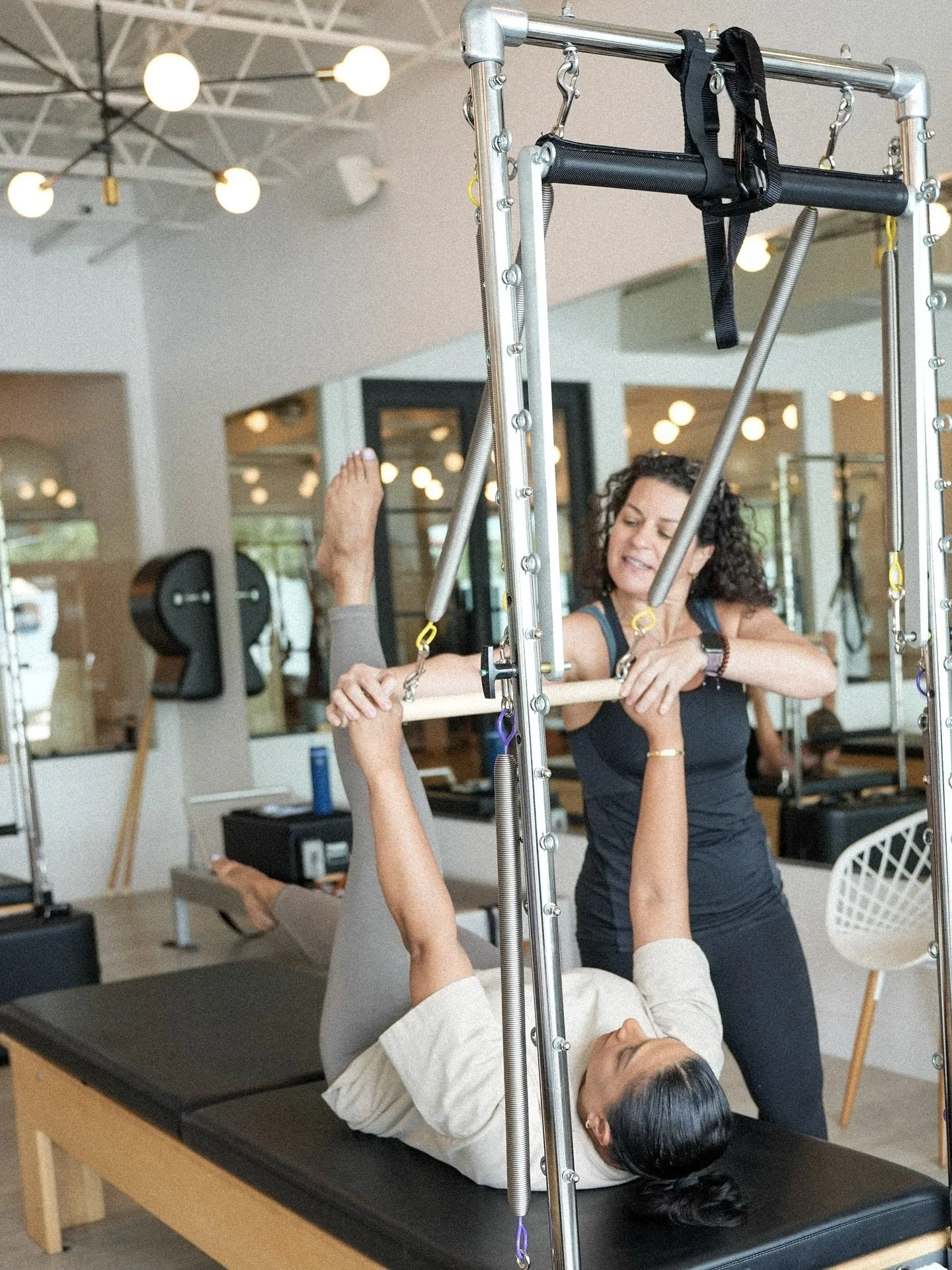 Let's talk TOWER!✨

The Pilates Tower class uses a vertical apparatus that is also known as the Half Cadillac.

One can do most of the cadillac exercises on this unique classical apparatus. Found in the front of our studio, we have six towers, making