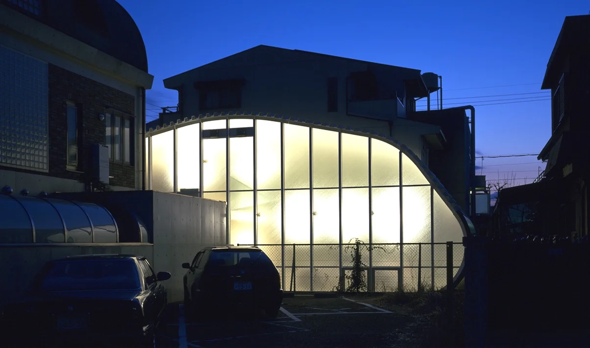 Vrooom! is a garage for an avid car enthusiast to house his collection of supercars. The challenge was to house six beautiful cars on a long narrow site and incorporate a study and viewing area on an upper level.