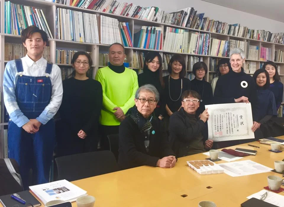 Members of the Home For All board, including Toyo Ito, Riken Yamamoto, Yasuhiro Yamashita and Astrid Klein, display the certificate for the 33rd Fukushima Architecture and Culture Award