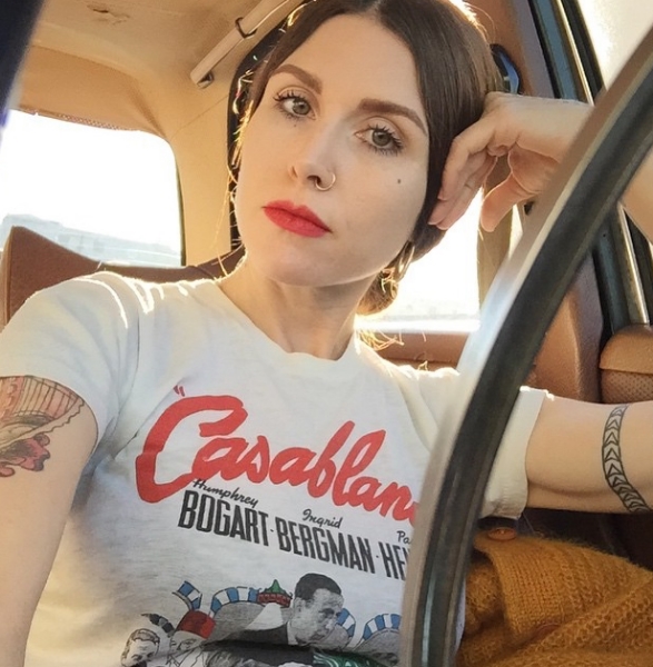 Ria in her vintage racer-green Mercedes.
