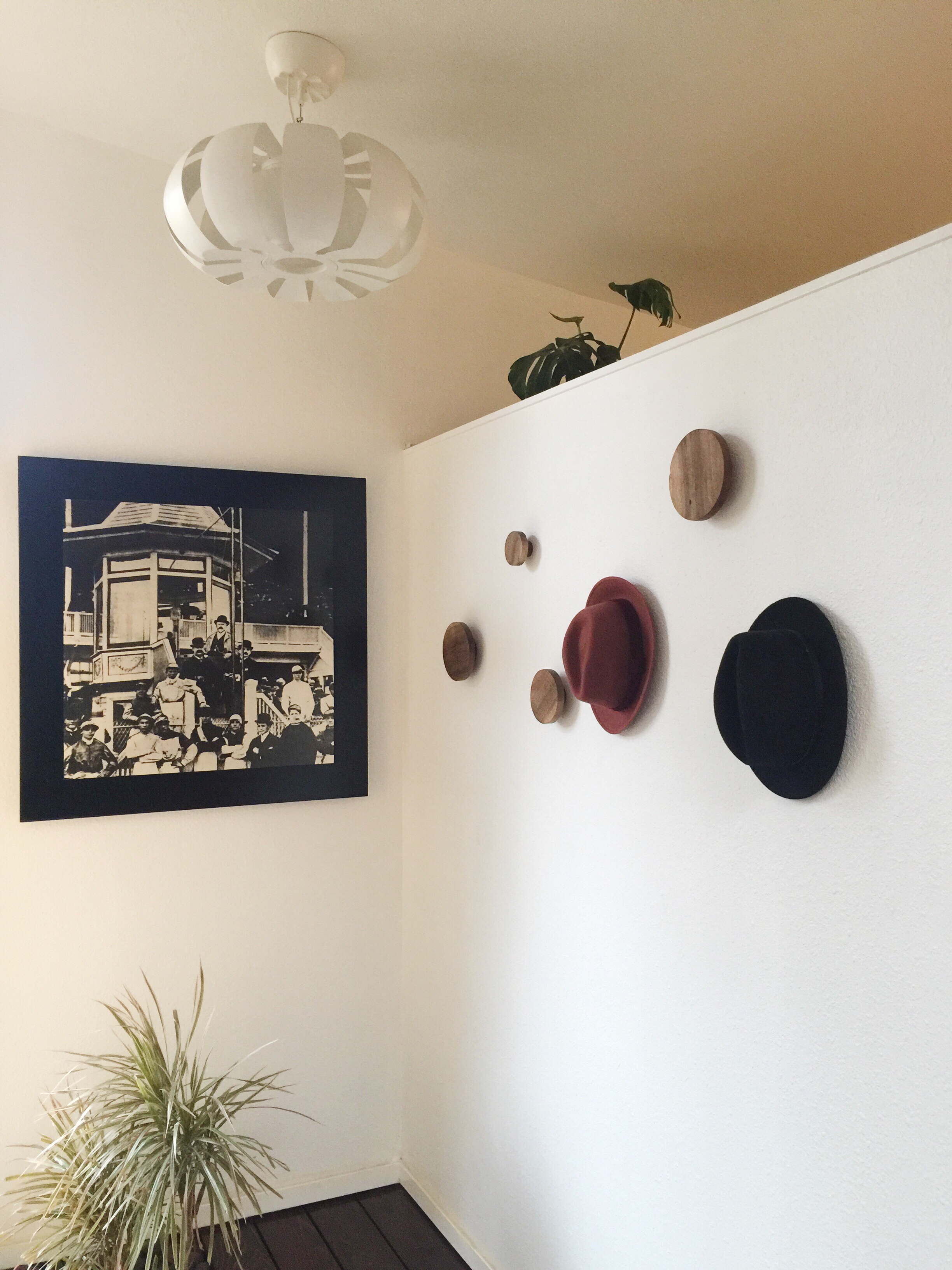  Hats artfully arranged, thrifted photograph.&nbsp; 