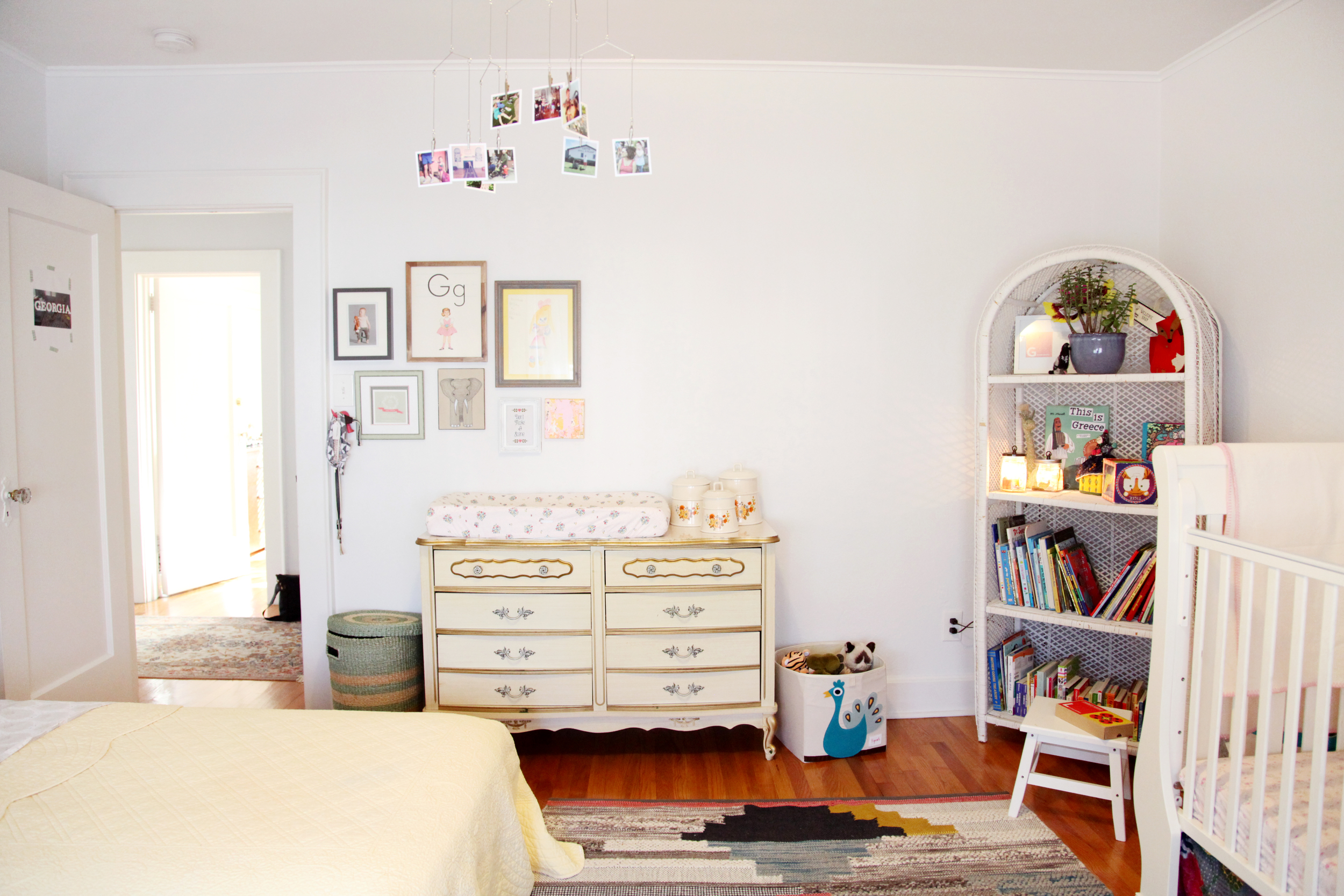  The shared room packs whimsy from wall to wall. Dressers from Dana's childhood. 