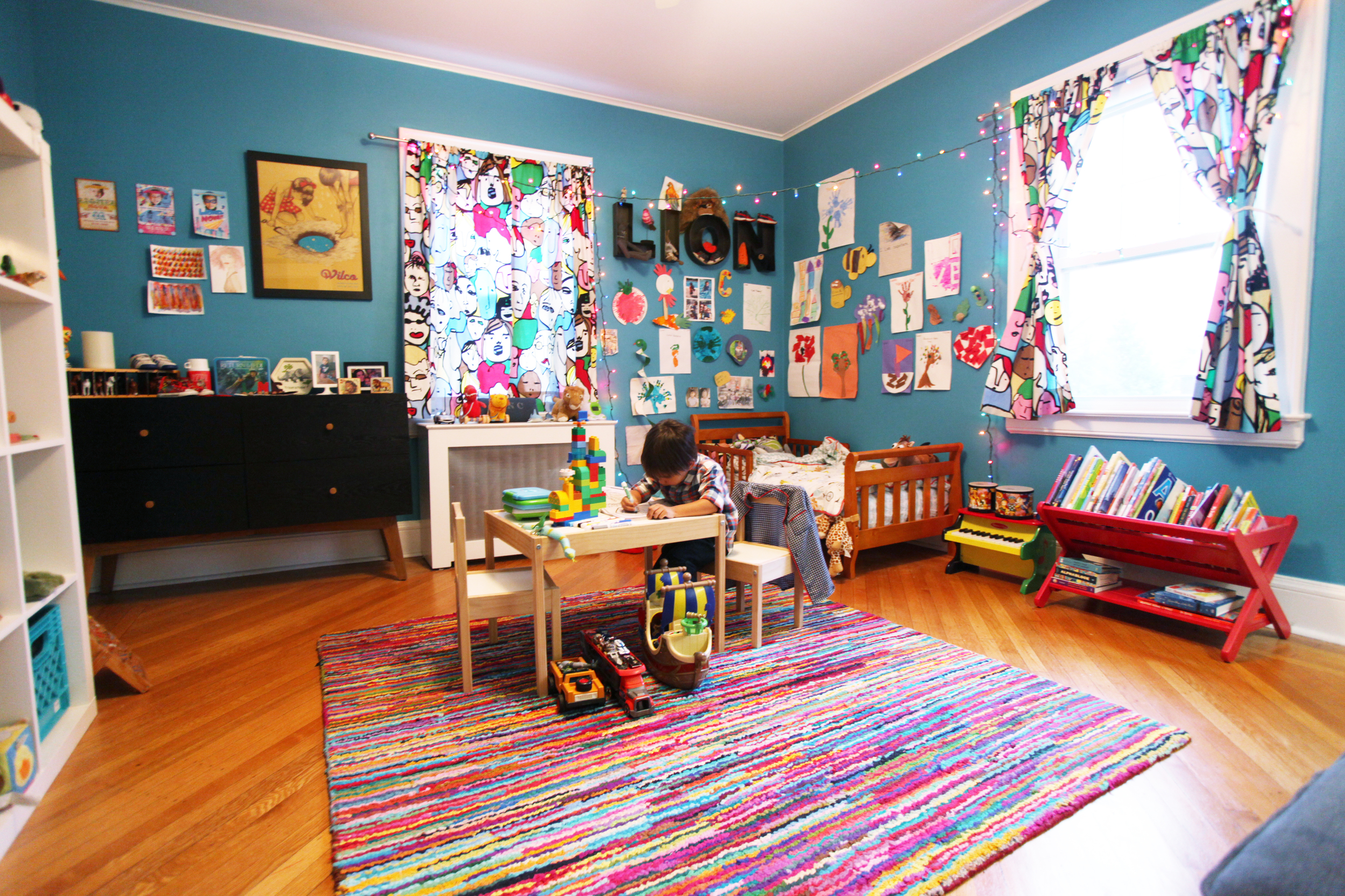  Creativity and play is fostered by a center art-table and gallery-like walls.&nbsp; 