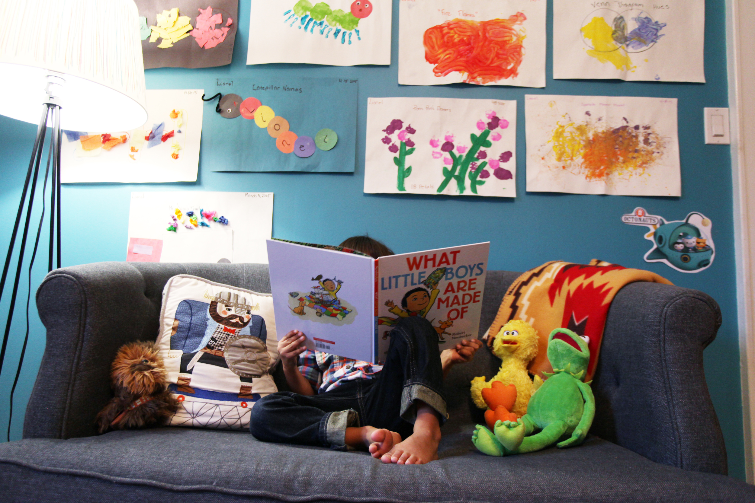  With his nose buried in a book on his own little cozy lounge area.&nbsp; 