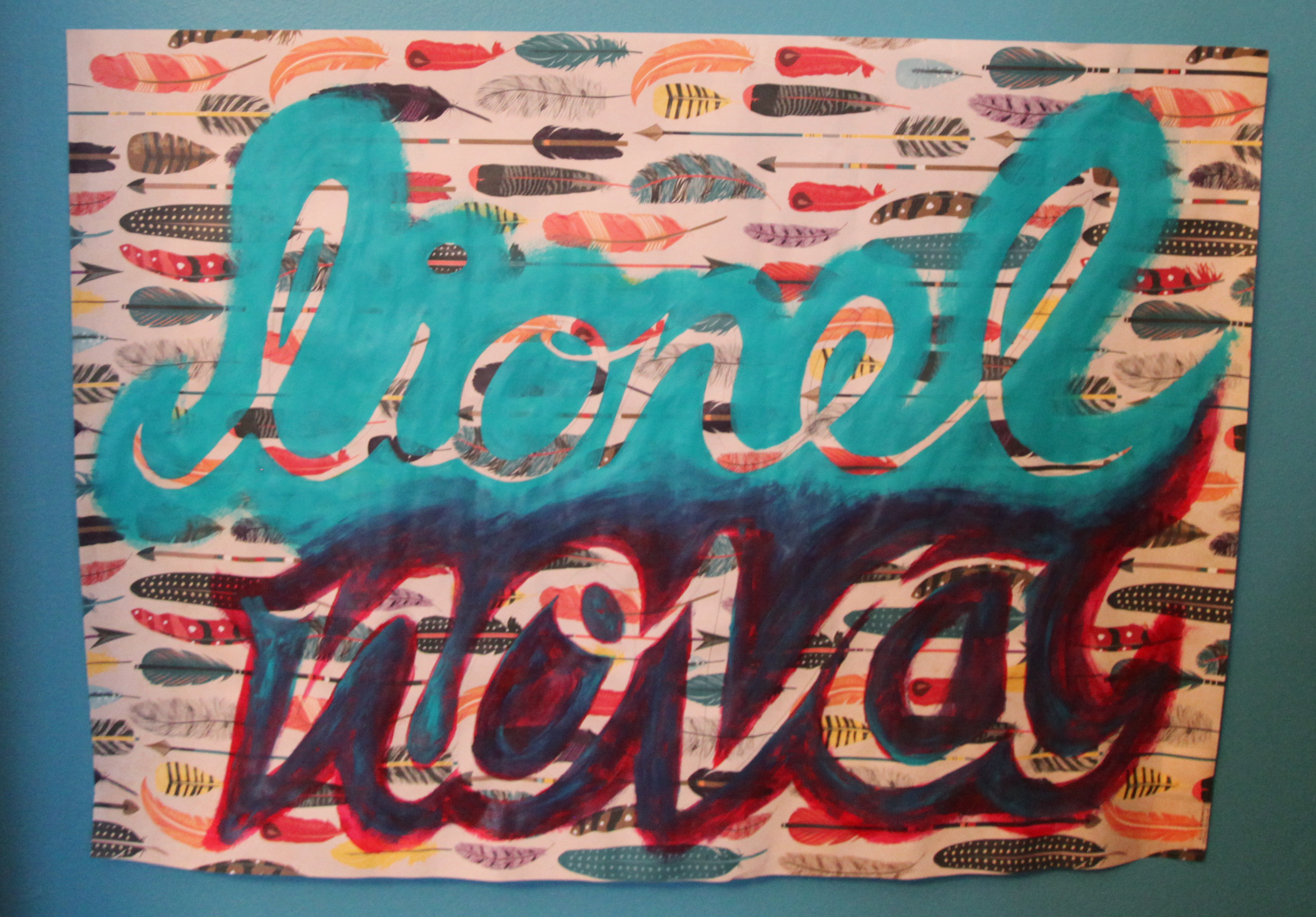  Benny painted the scripted "Lionel Nova" sign on wrapping paper.&nbsp; 