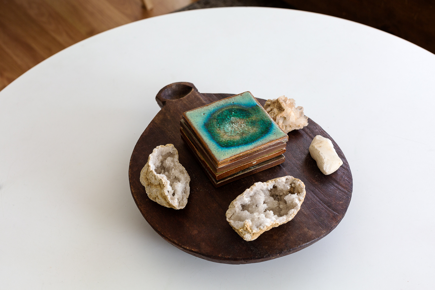  Rock-lover. A pile of   Anthropologie  &nbsp;coasters and some gathered geodes from travels to the ocean and Colorado. 