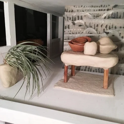 Mini murals, stacks of perfect pottery.