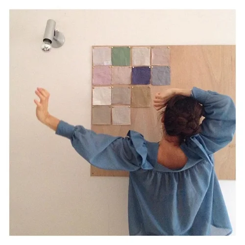 The artist, found in a continued series of backward-facing self-portraits on Instagram.