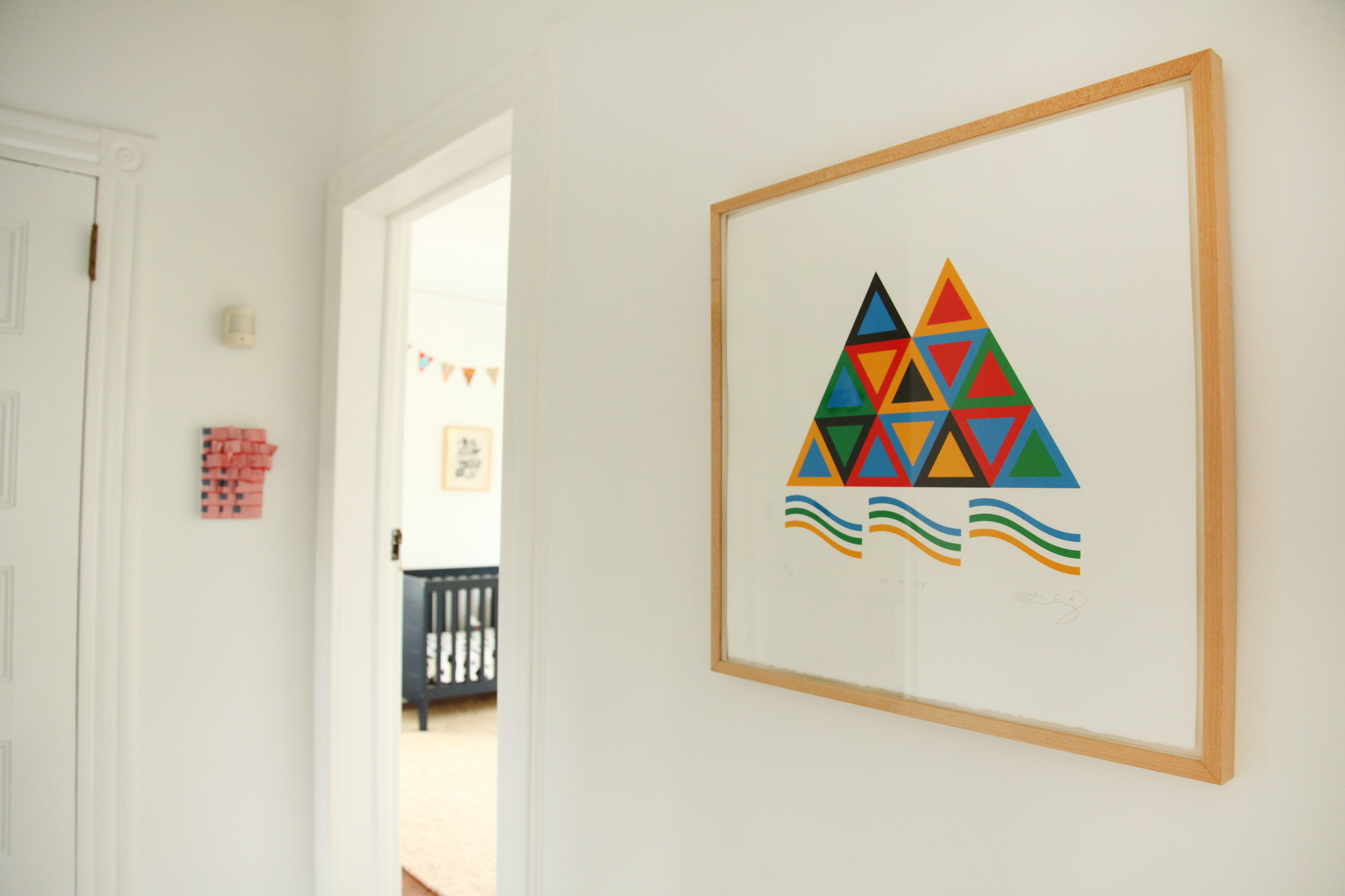  Triangle piece by  Matt Irving.  Danielle made the American flag collage that &nbsp;hangs in the back. 