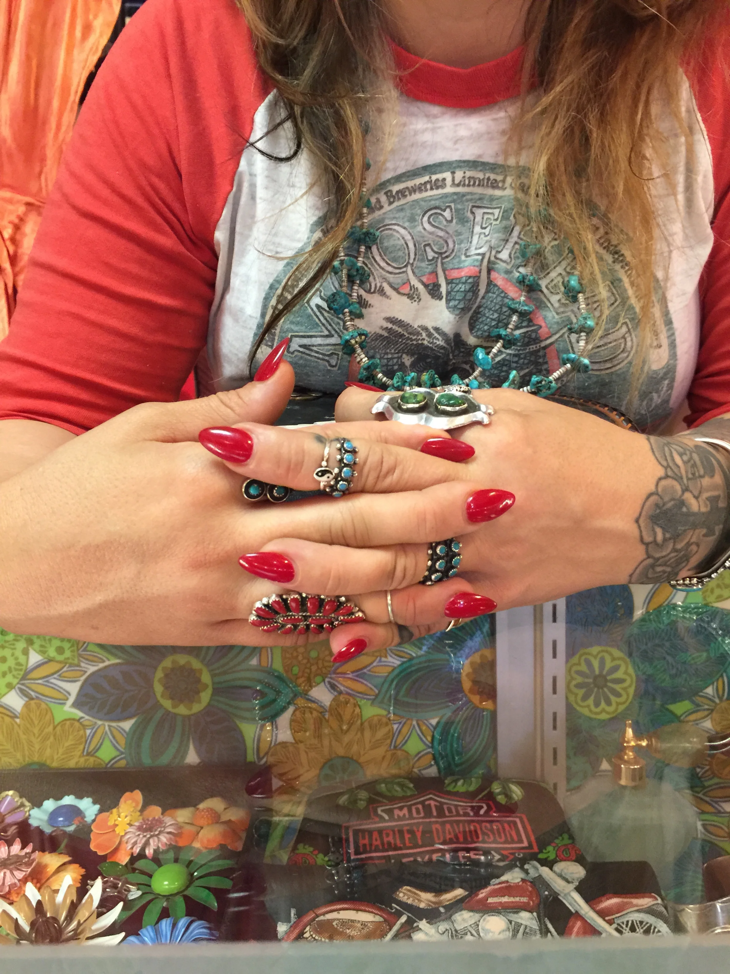  Turquoise dreams. Fetish beads, zuni rings, and squash blossoms snuggle up to a fun collection of retro and local designs.&nbsp; 