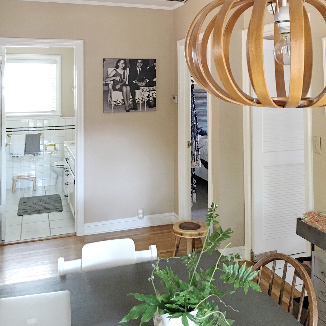  One of the couple's first home purchases: a West Elm light fixture sets the tone.&nbsp; 