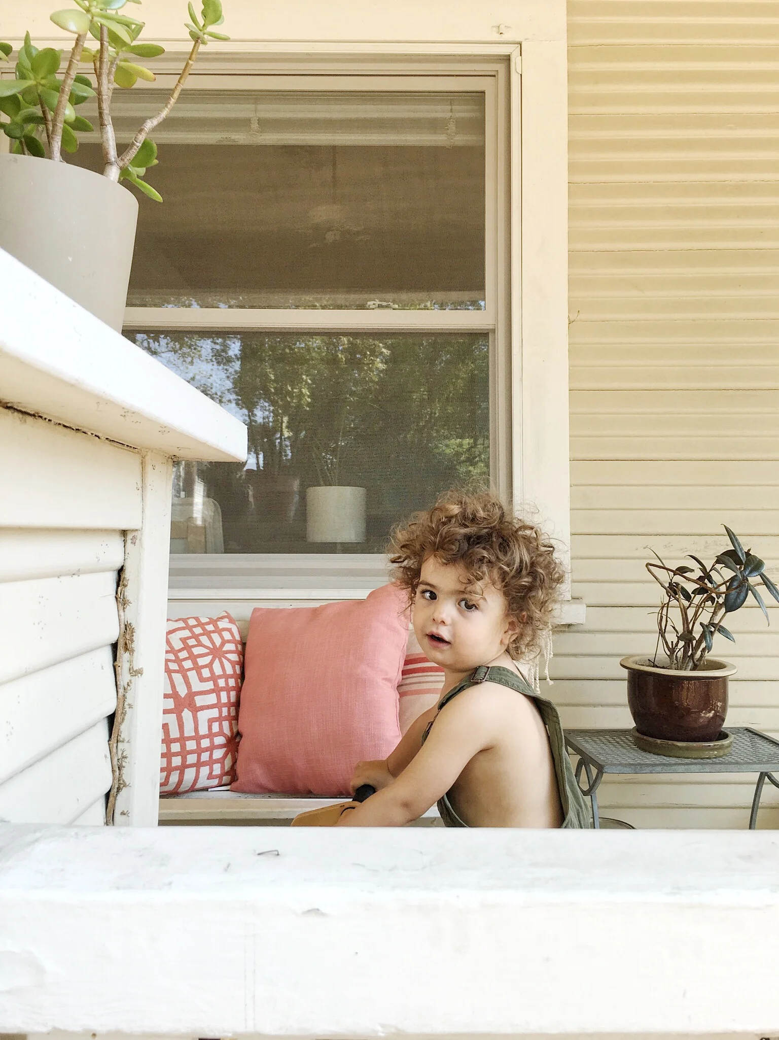 Zain Oliver's cherub-charm.