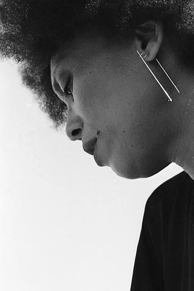 Laurence, photographed with her THEMIS earrings, Martinique, September 16.