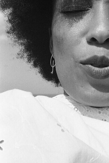 Laurence with QUAN earrings. Martinique, September, 2016.