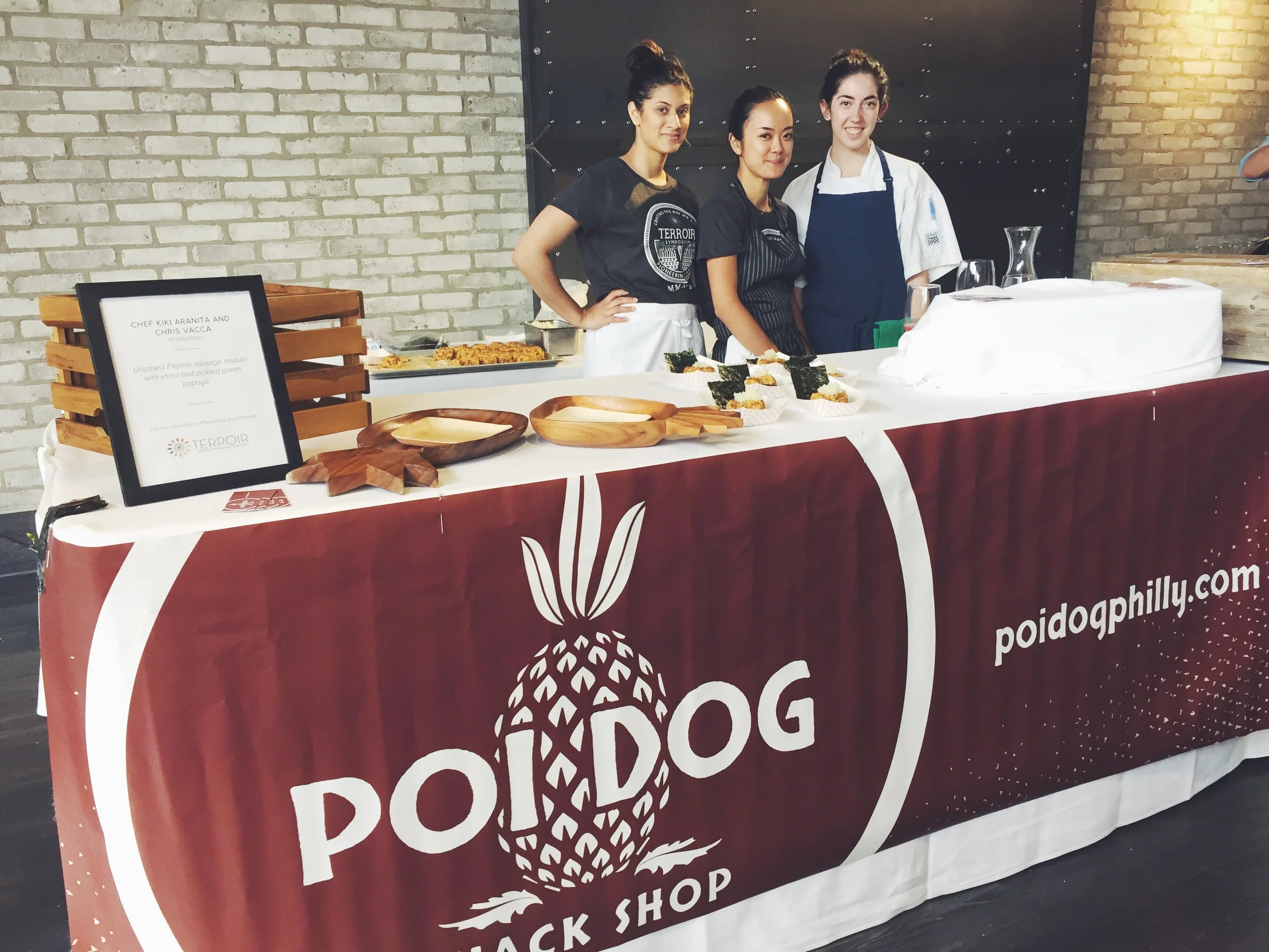 Serving longanisa musubis at the Terroir Symposium