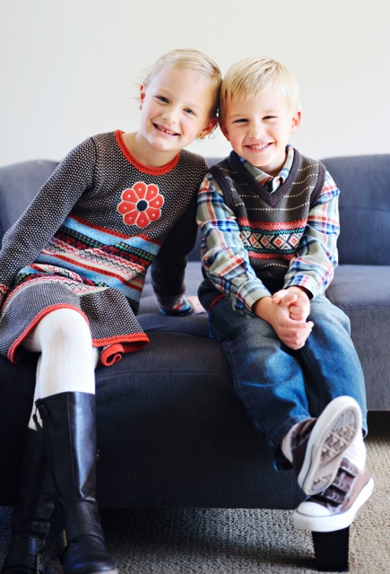 This is a great example of matching and it working really well. Siblings wearing something from the same line but in different patterns. Great job of coordinating outfits but not too matchy matchy and good use of mixing patterns. 