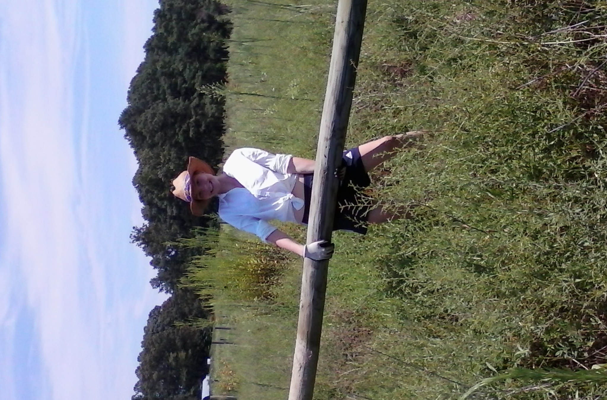 Anna lifting one of the 492 posts moved from the old Pinot Grigio vineyard.
