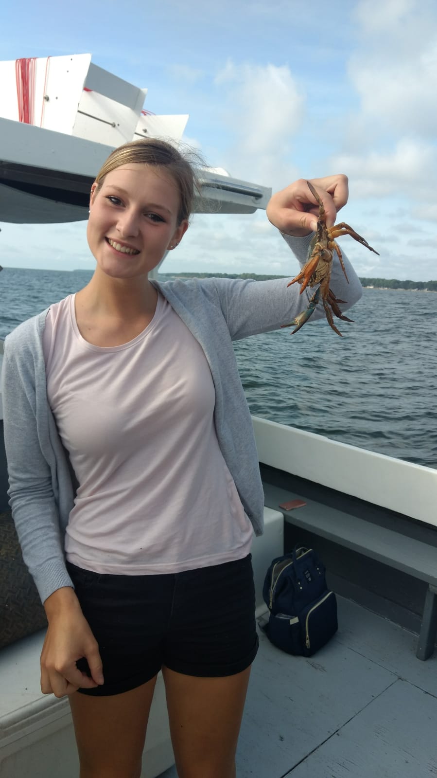 Tina shows us how to hold a crab --- and not get clawed!
