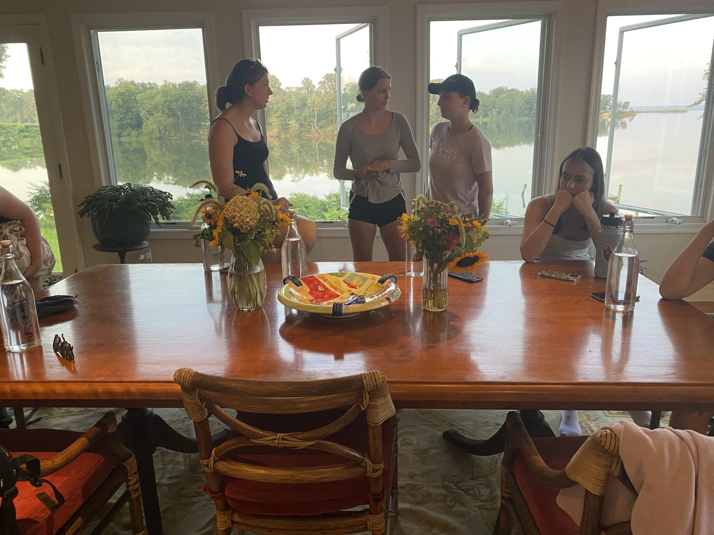 Helena, Kathi and Lisl (aka Bob the Builder) with Katrin discussing the Jubilee Office renovation Fri July 2,2022