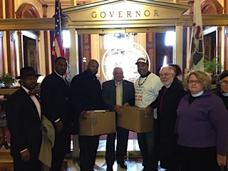 Leaders Network helps deliver over 50,000 signatures to Governor Quinn calling for new gun legislation in Illinois