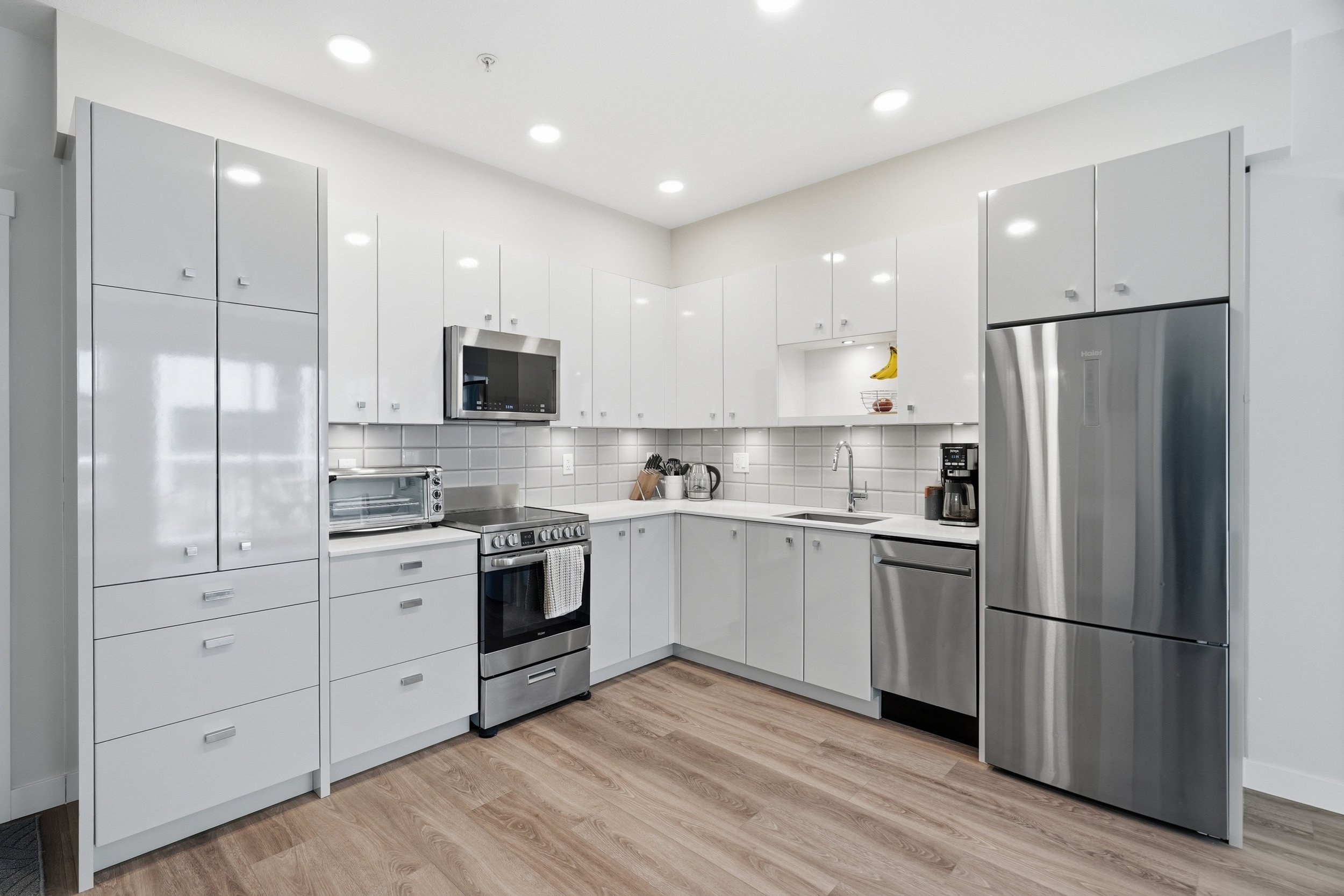 10-211 10838 Whalley Blvd.jpg