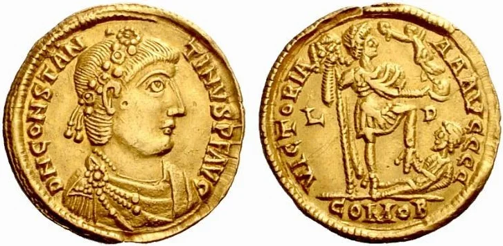 Gold solidus of Constantine III, minted at Lyon. The reverse shows him trouncing a fallen barbarian.