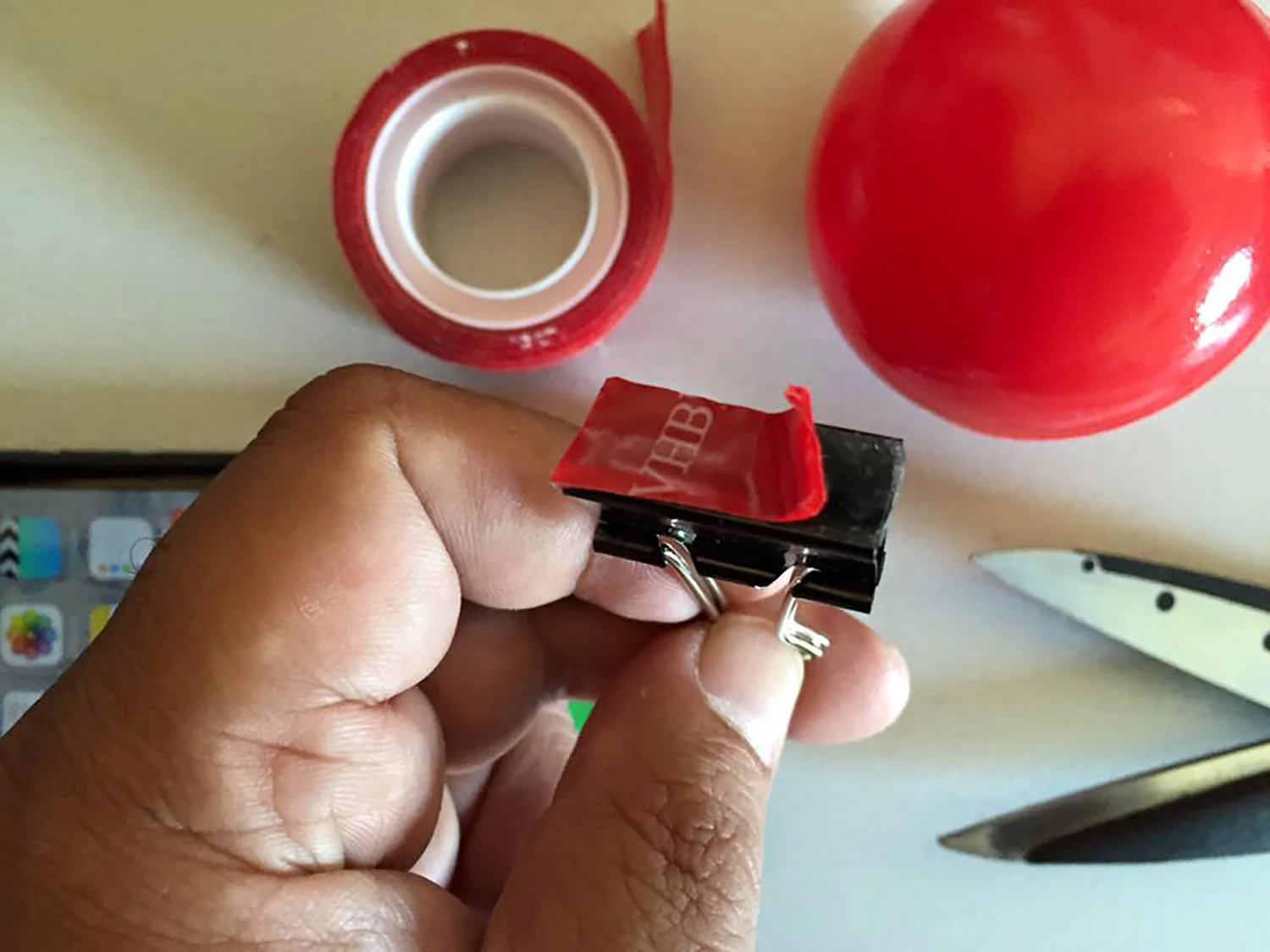 3. Stick the tape firmly on the clip.