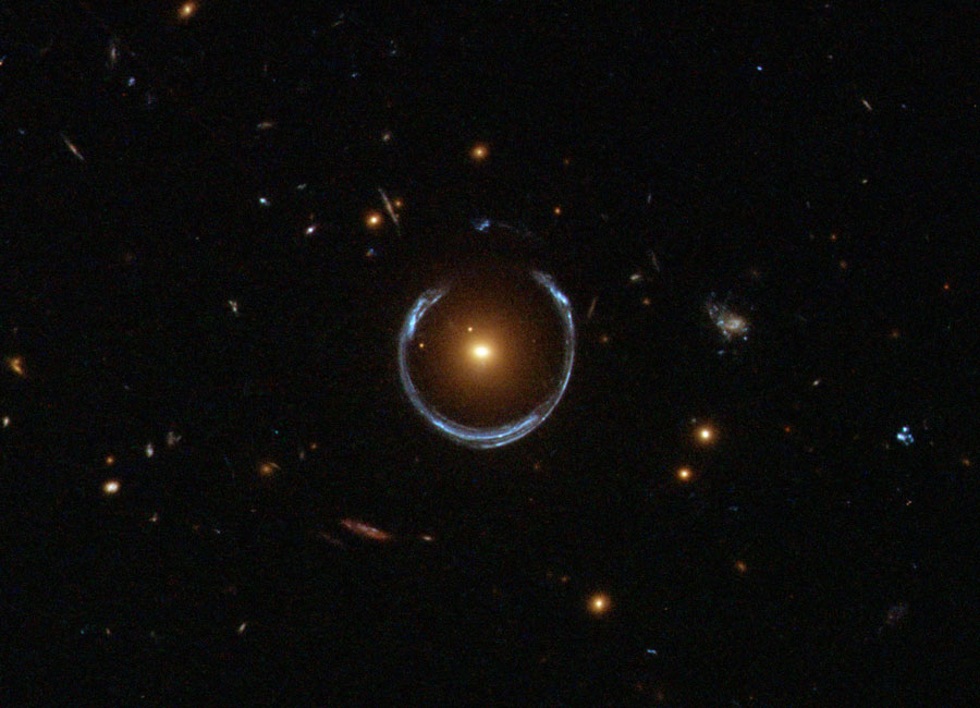 An "Einstein ring", which is a distorted image of a distant galaxy caused by gravitational lensing. ESA/Hubble/NASA (public domain)
