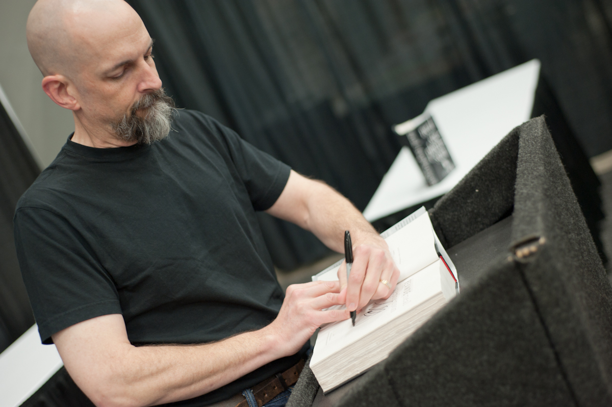 Neal Stephenson at a book signing at GDC Online in 2011. GDC Online/Flickr (CC BY 2.0)