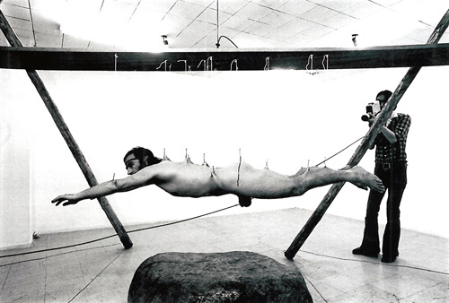 Stelarc during one of his suspension performances, ‘Stretched Skin’, Sydney, 1976. Biennale of Sydney/Flickr (CC BY-NC-ND 2.0)