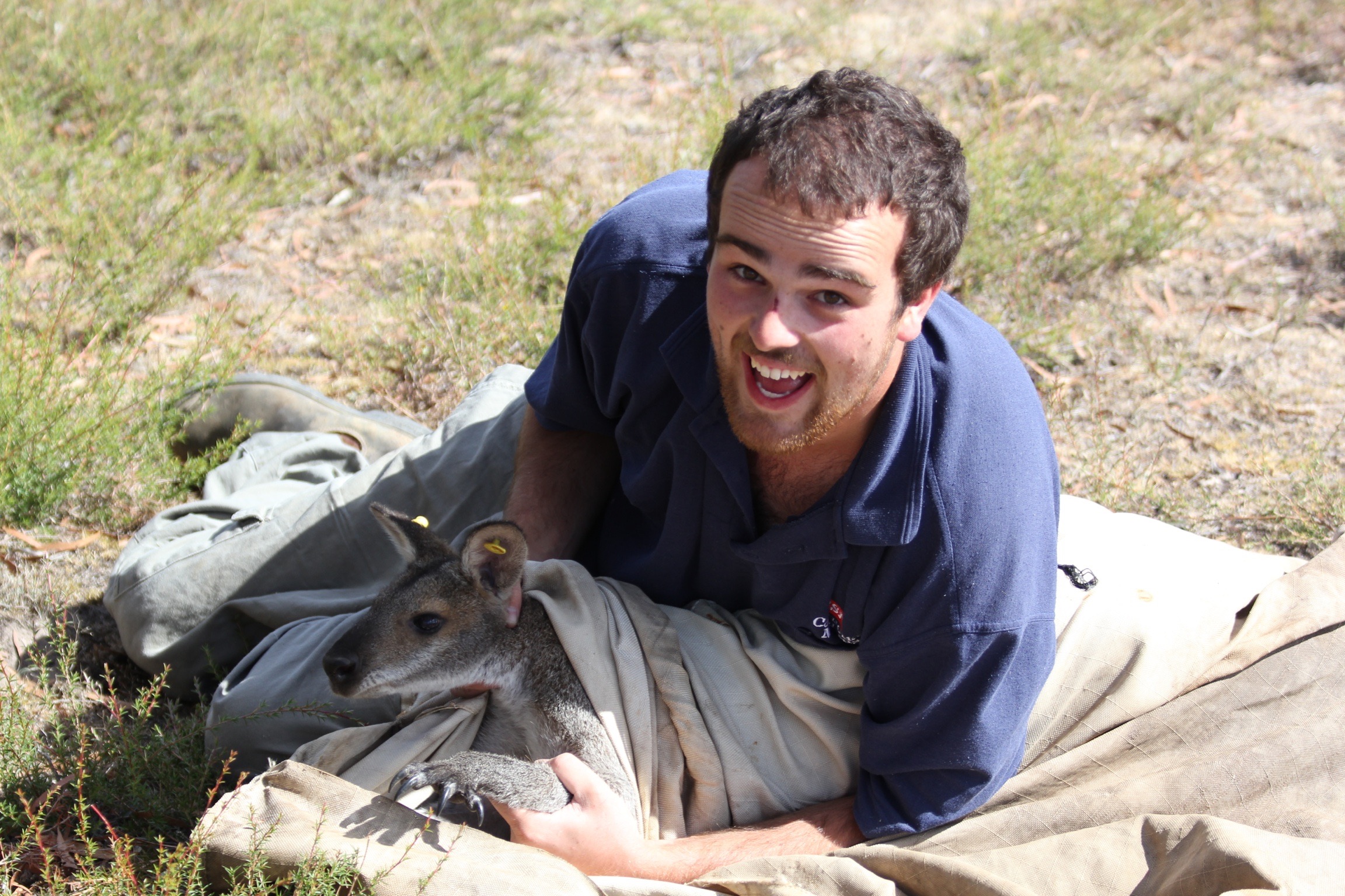 Ecologist John Sharp with his study species, the red-necked wallaby. John Sharp (used with permission)