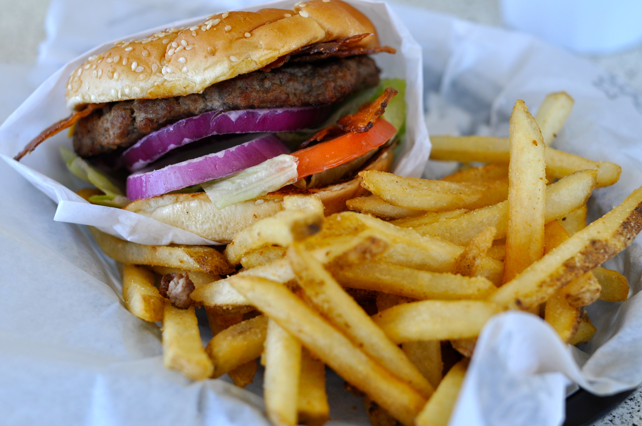 Food becomes less pleasurable as dopamine tolerance increases, even when consuming those considered "guilty pleasures". powerplantop/Flickr (CC BY-NC-ND 2.0)