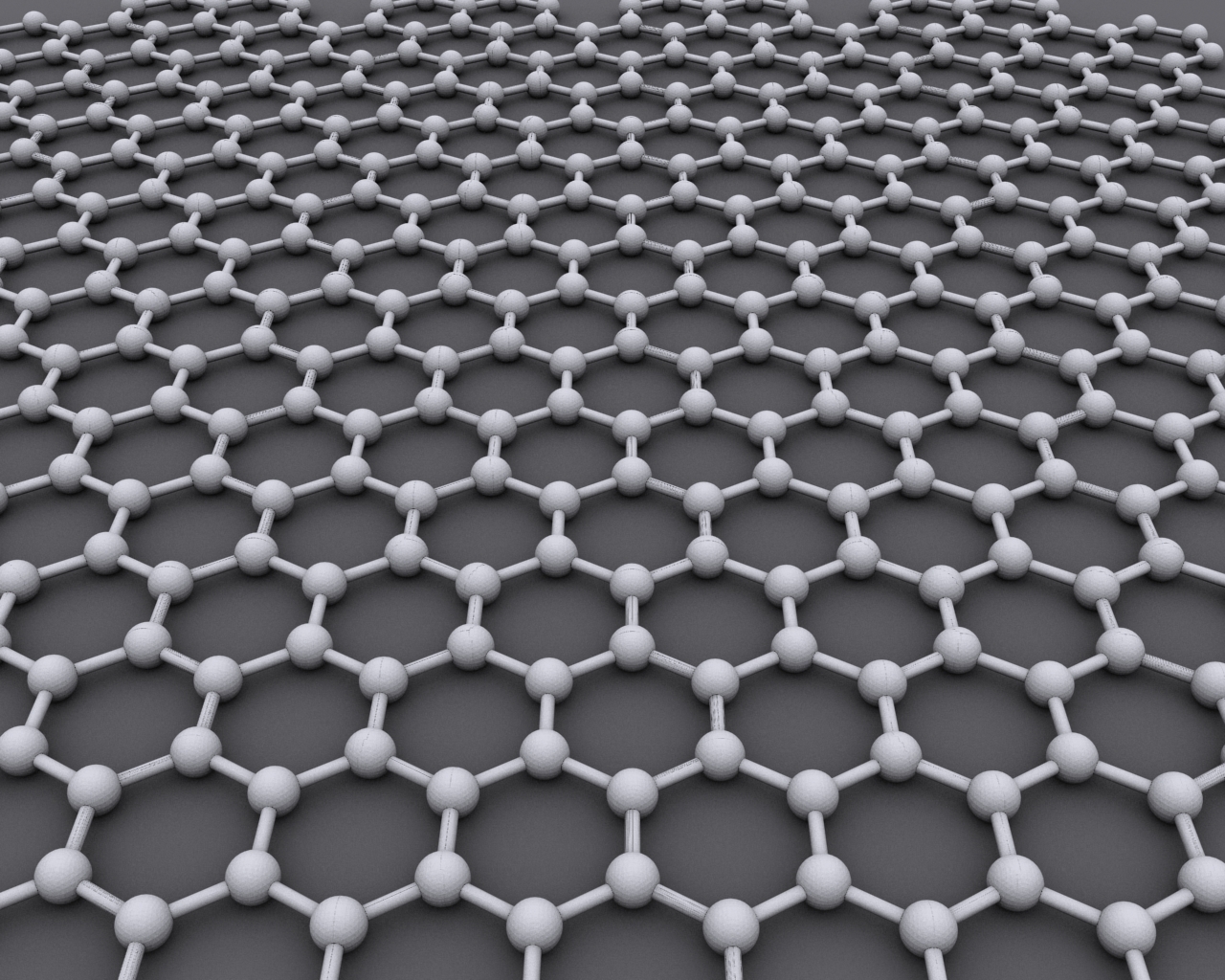 The interlocking, hexagonal pattern of a sheet of graphene. AlexanderAIUS/Wikimedia Commons (CC BY-SA 3.0)