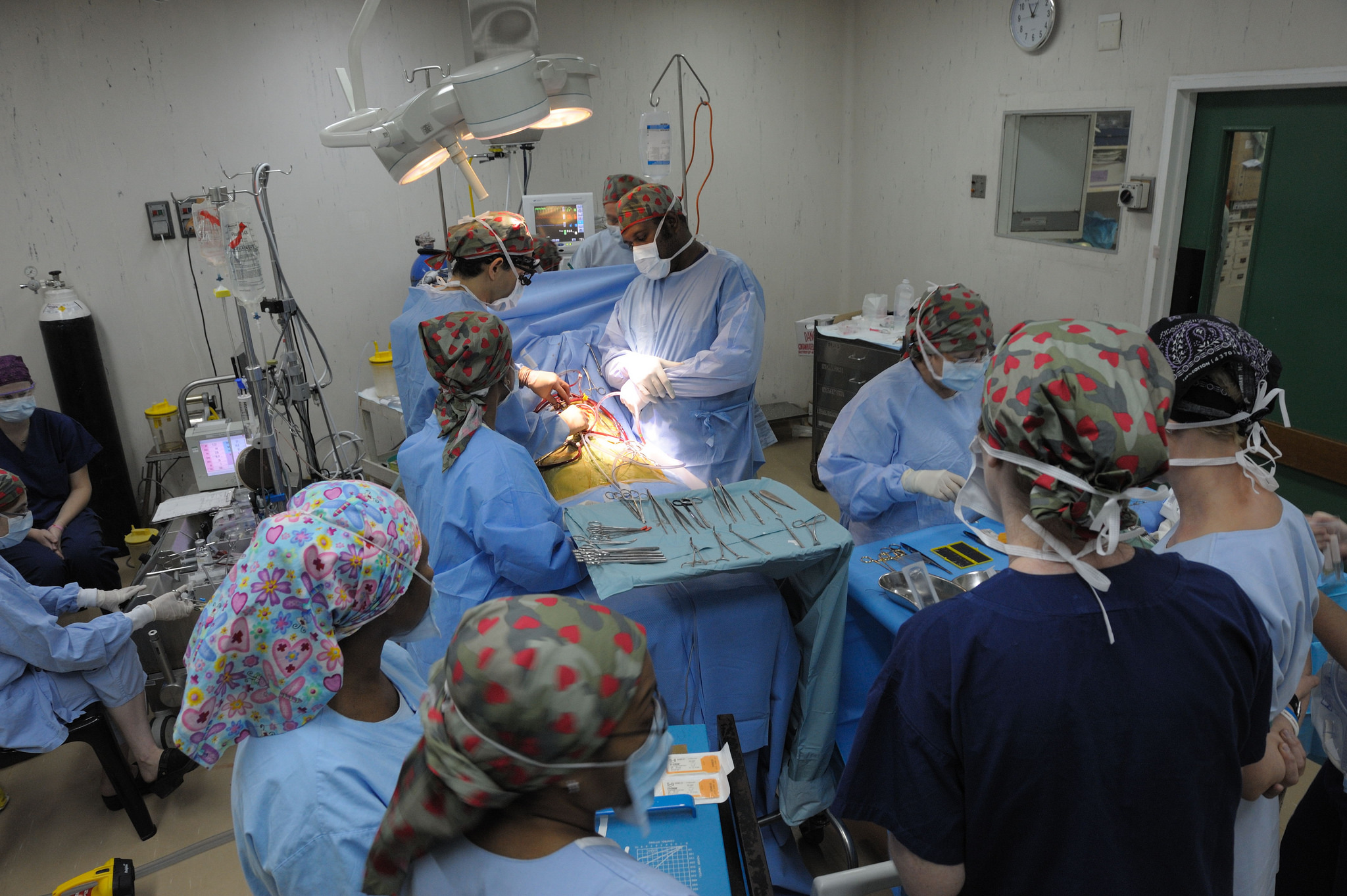Doctors from Australia and Papua New Guinea perform open-heart surgery . Rocky Roe for AusAID via DFAT/Flickr (CC BY 2.0)