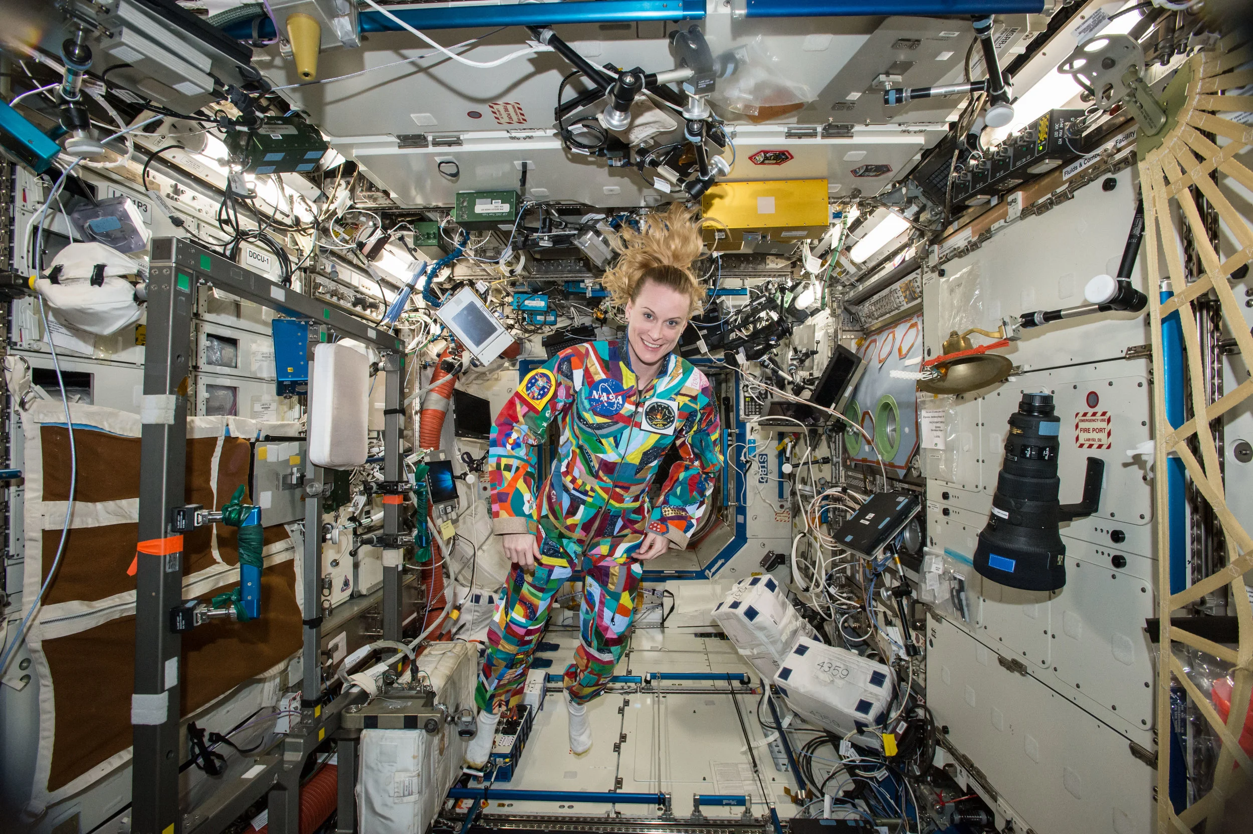 Astronaut Kate Rubins on board the ISS, wearing a hand-painted space suit from the Space Suit Art Project. NASA (CC BY-NC 2.0)