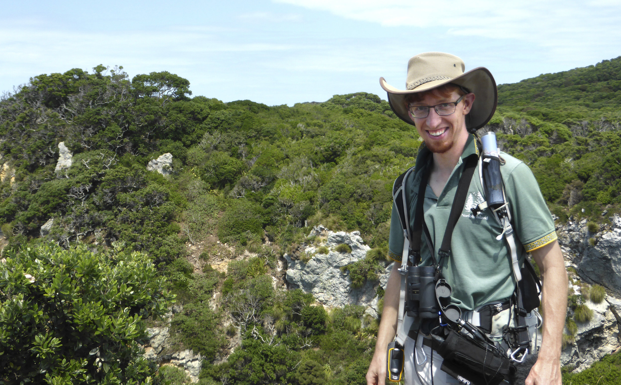 Wesley Webb, hard at work studying New Zealand bellbirds. © Wesley Webb