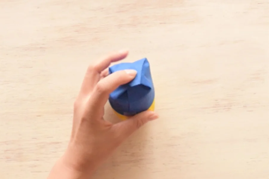 Step 4: Make sure to close the front side of the paper last for the best presentation. Tape to secure the end.