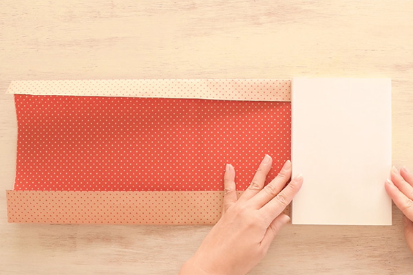 Step 2: Fold the top and bottom ends to the height of the book.
