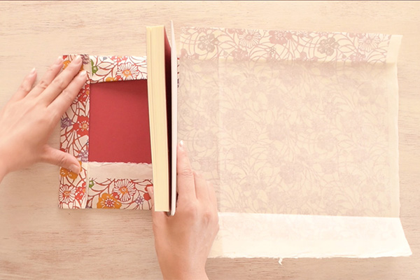 Step 12: Fold up all the creases to close one side of the book.