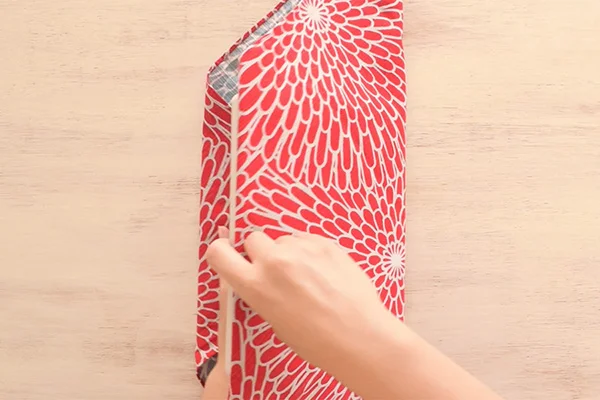 Step 3: Do the same to wrap the left side cover of the book.