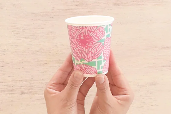 Step 4: Wrap the the paper around the paper cup then close the ends with double sided tape. 