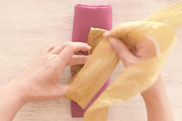 Step 5: Make the second loop at the same size as the first one at the bottom left position.
