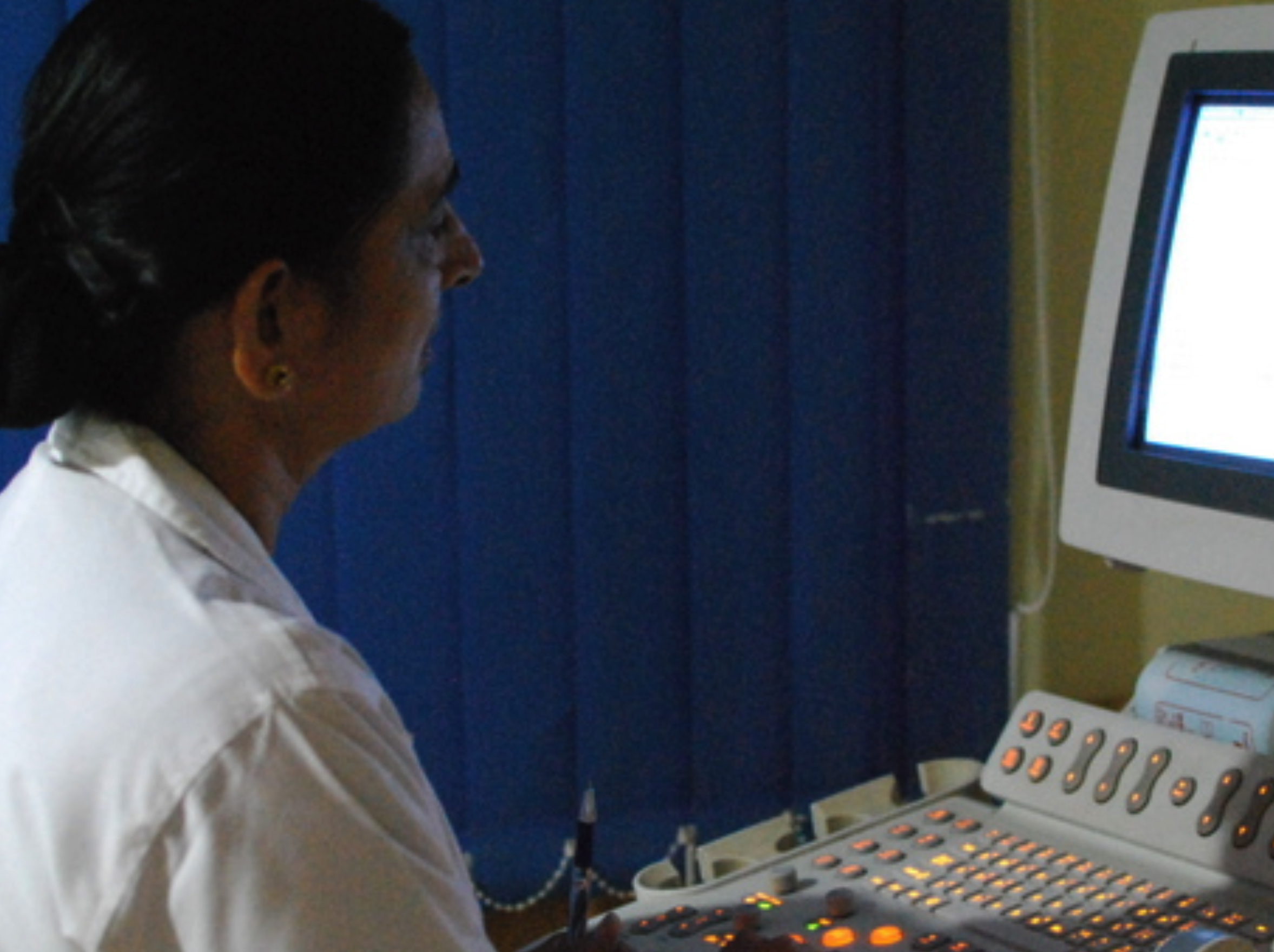 Doctor operating an ultrasound device