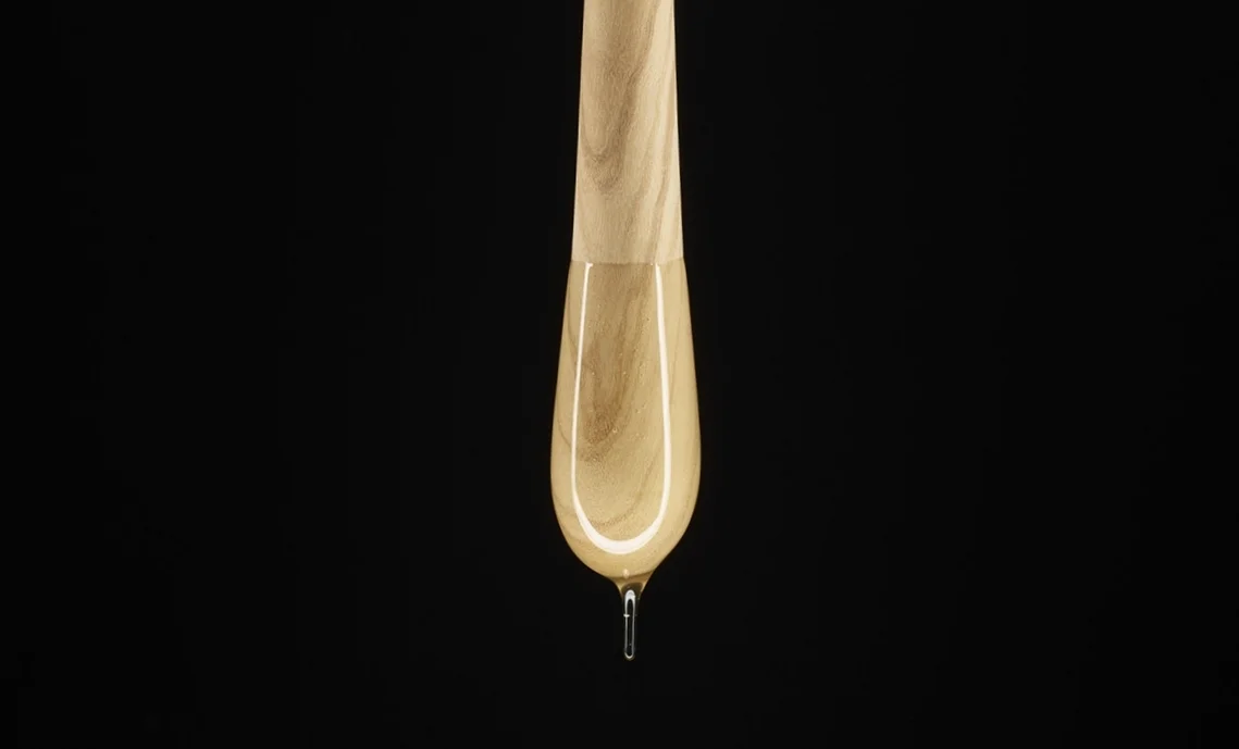 Olive Wood Goûte dripping honey. Photo: Orion Dahlmann