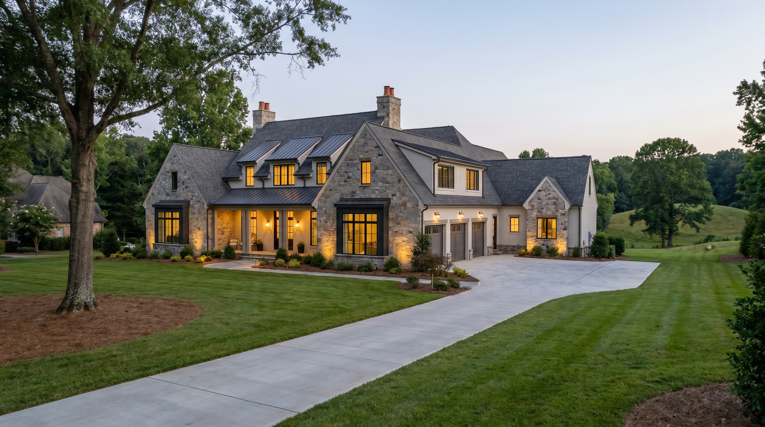 Rendering of a luxury American home with stone, stucco and metal roofing accents set in the Piedmont Triad area of North Carolina. Design and build in Winston-Salem and surrounding areas.